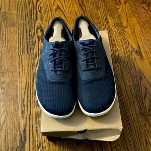 OluKai Blue Sneakers with Sleek Design and Textured Soles